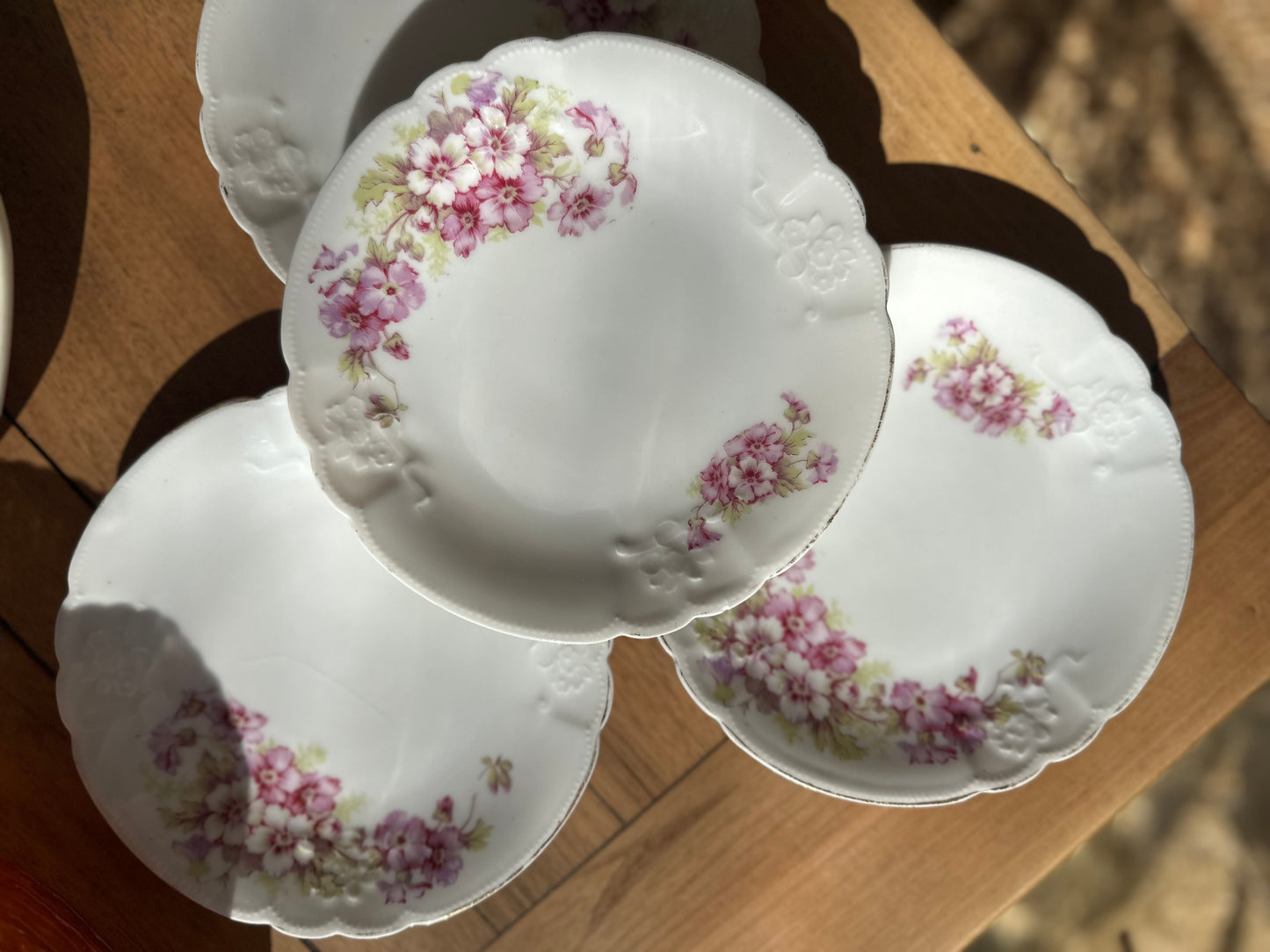 11 assiettes à dessert porcelaine De Raymonde à Zoé