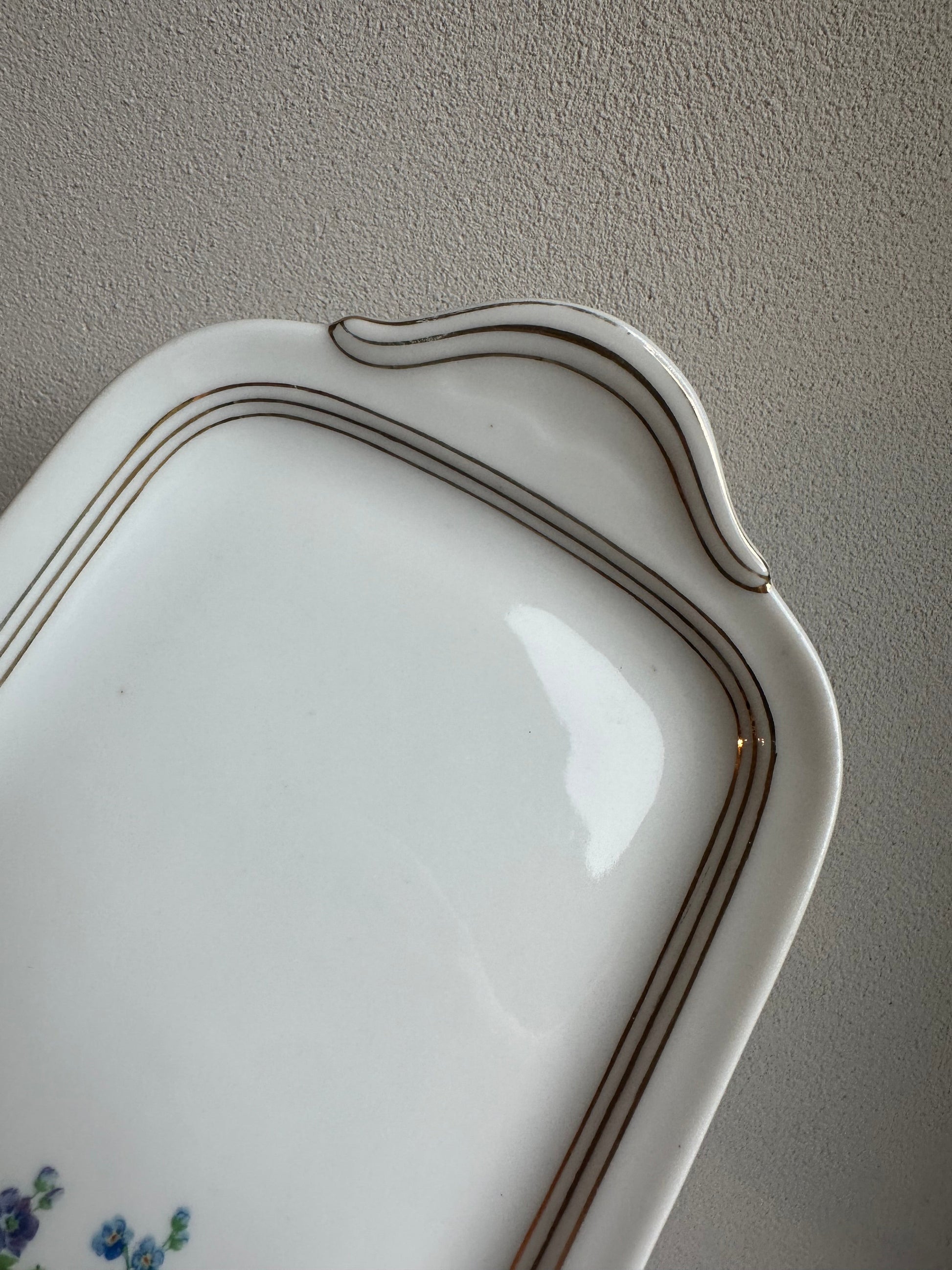 Plat a cake en porcelaine de Limoges De Raymonde à Zoé