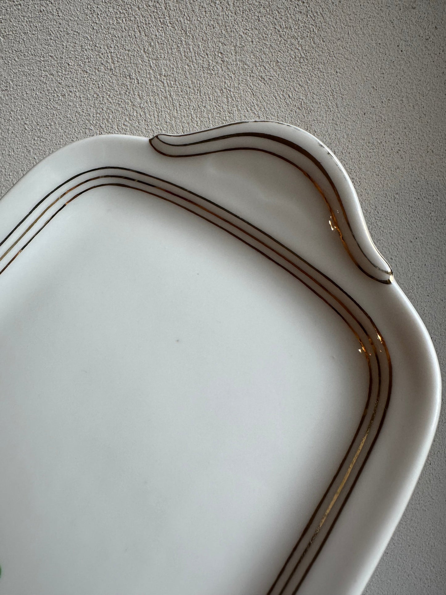 Plat a cake en porcelaine de Limoges De Raymonde à Zoé