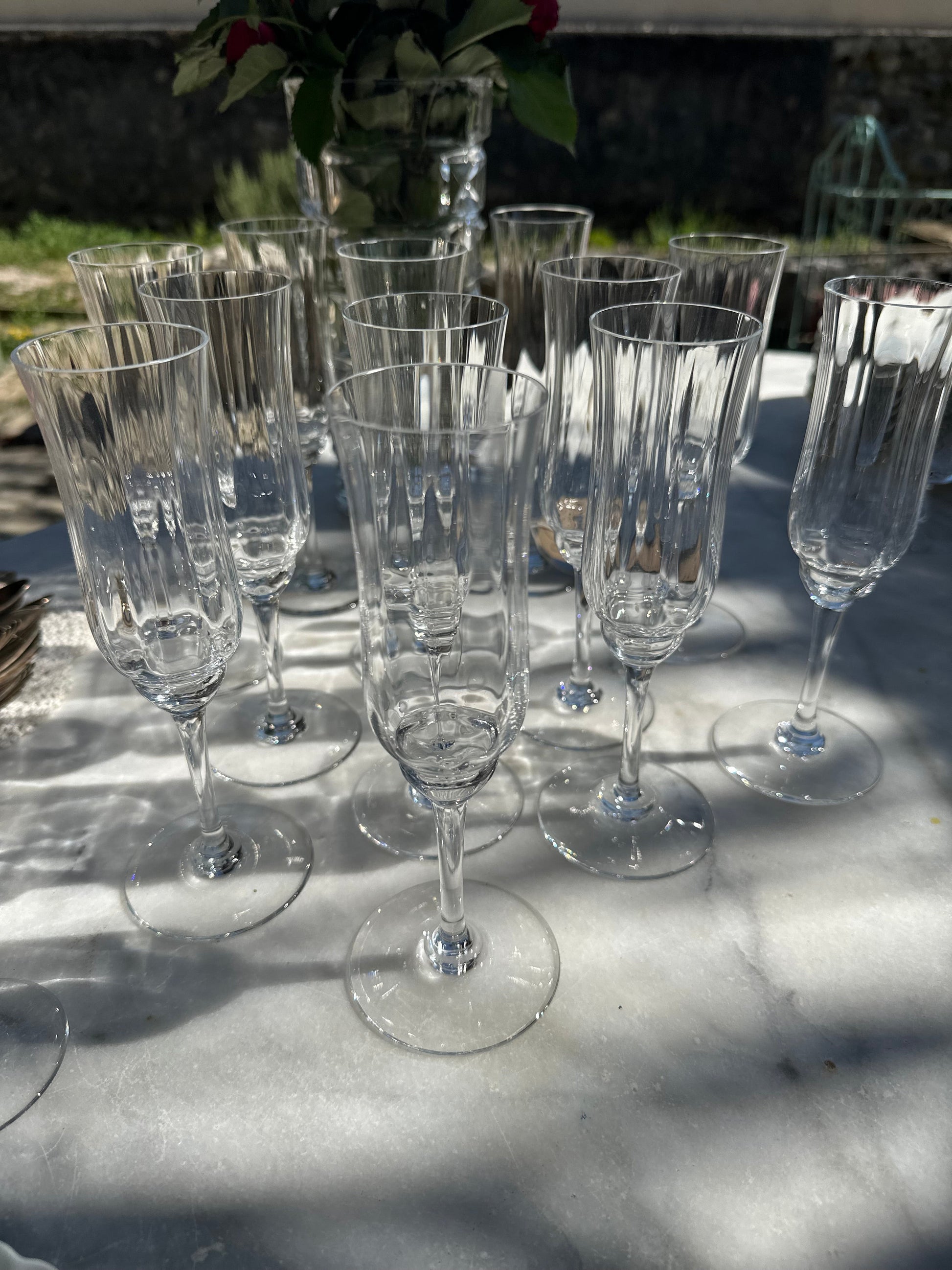 Ensemble de 12 flutes a champagne cristal de Baccarat De Raymonde à Zoé